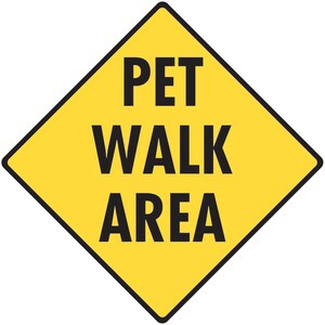 May include: A yellow diamond-shaped sign with a black border and the text "PET WALK AREA" in black.