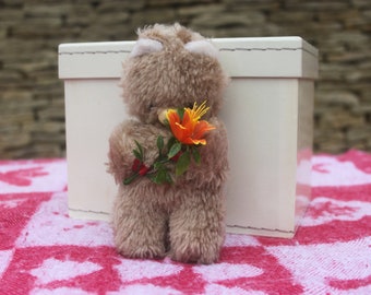 Small vintage plush bear possibly made in Berlin Germany 16 cms long holding flower, children's toys, souvenir toys, plush bear plushies