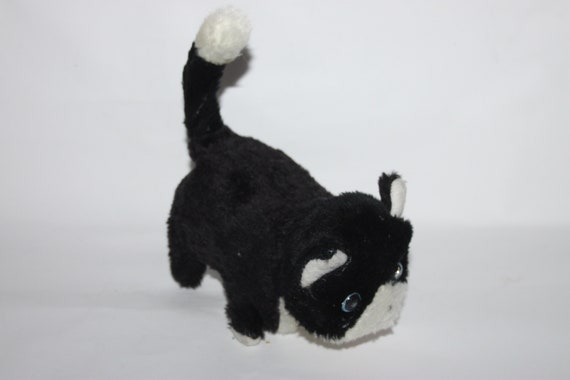 Mechanical top toy cat
