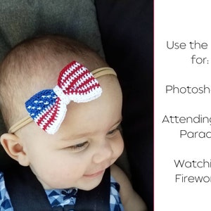 May include: A baby wearing a red, white, and blue crocheted bow headband. The headband is on a nude elastic band. The baby is looking down and smiling.