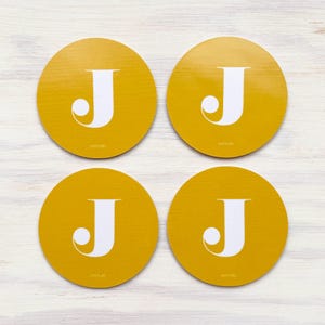 Juego de posavasos J: o elija cualquier letra del alfabeto