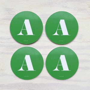 Un juego de posavasos o elige tus propias letras o patrones del alfabeto