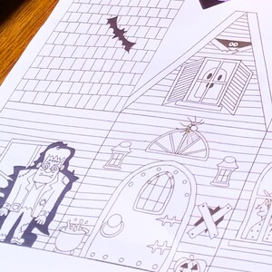 Completed printable in 2D haunted house showcasing how the left side and front looks upclose . It features detailed Halloween elements including a spider, zombie, large door, bat and a ghost.