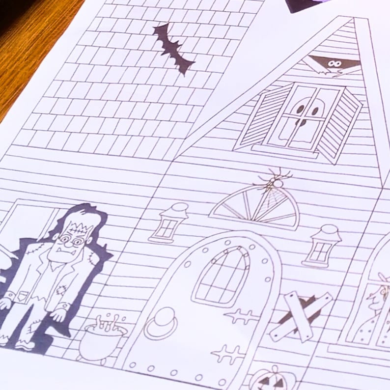 Completed printable in 2D haunted house showcasing how the left side and front looks upclose . It features detailed Halloween elements including a spider, zombie, large door, bat and a ghost.