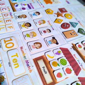 Interactive alphabet activity sheet displaying uppercase and lowercase letters with corresponding images for each letter
