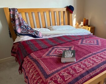 Hand screen printed blanket with Indian print, and handstitched kantha quilting.