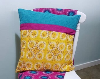 Geometric, yellow star print cushion, with kantha quilt stitching.