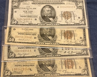 May include: Four vintage $50 US dollar bills from different Federal Reserve banks. The bills are in good condition and feature portraits of Abraham Lincoln.