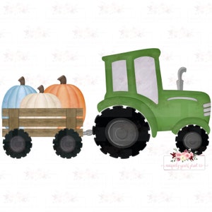 May include: A green toy tractor pulls a wooden wagon filled with three pumpkins. The pumpkins are blue, white, and orange. The tractor has black wheels and a gray cab.
