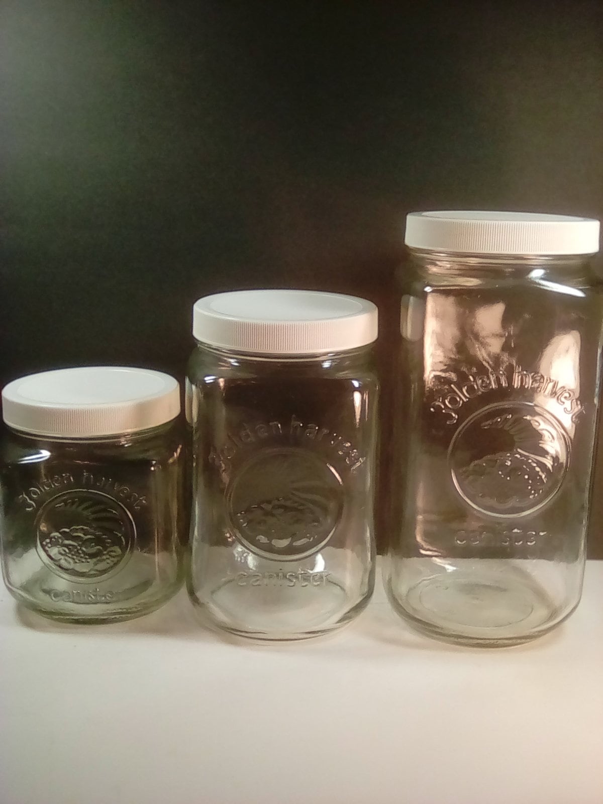 Lot de 3 bidons Golden Harvest en verre transparent avec couvercles en plastique colorés