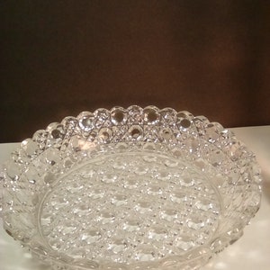 Beautiful heavy clear glass raised rim plate