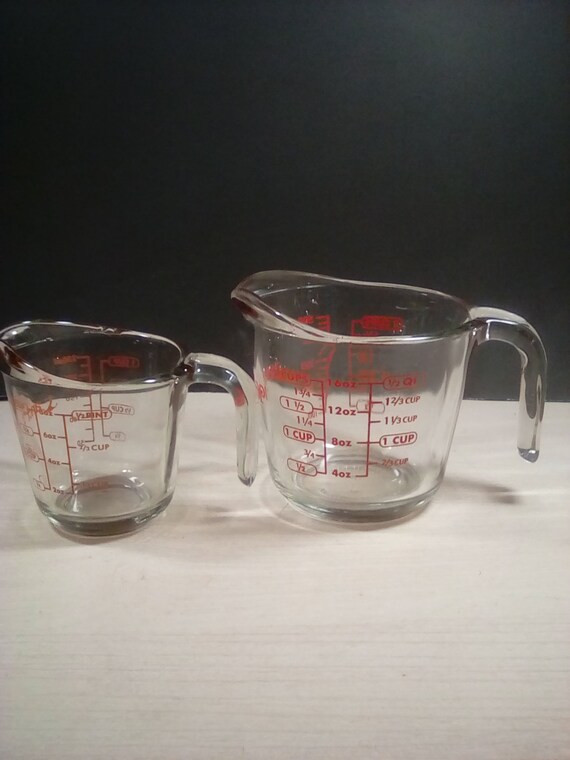 2 Vintage Anchor Hocking Advertising 5 oz. Measuring Cup Juice Glass