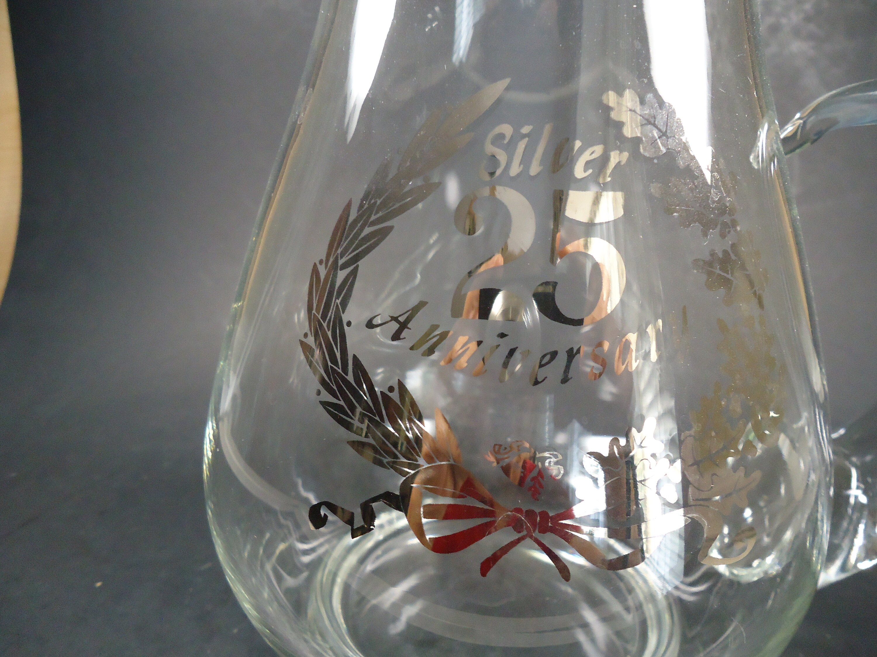 Small Glass Pitcher With Silver 25 Anniversary Emblem 