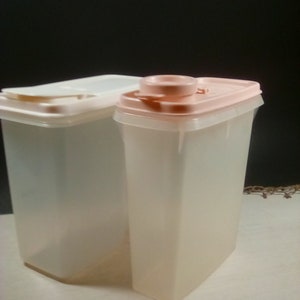 2 Tupperware small storage  containers  with lids