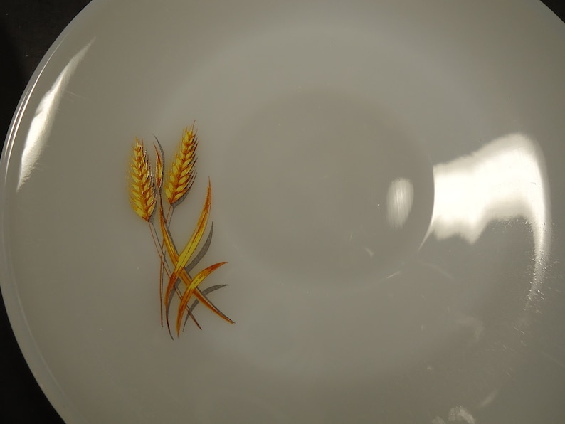 milk glass saucers Set of 7 Fire king wheat design