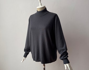 Zachte merinowol, zijde en kasjmier - Relaxed fit gebreide damessweater met opstaande hals