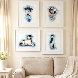 May include: Four framed wall art prints featuring watercolor-style illustrations of a black and white dog in various poses, including standing with a blue ball, looking upward, lying down, and sitting, all set against a soft blue background.