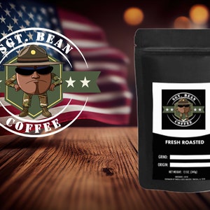 May include: A black bag of coffee with a white label. The label has a cartoon of a coffee bean wearing a military hat and sunglasses. The text on the label reads "Sgt. Bean Coffee" and "Fresh Roasted".
