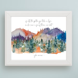 May include: Watercolor painting of a forest with mountains in the background. The quote "Of all the paths you take in life, make sure a few of them are dirt" is written in black cursive at the top of the image. The quote is attributed to "John Muir" at the bottom of the image.