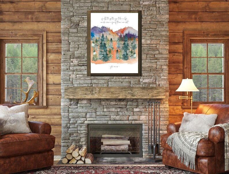 jon mur quote art printable of all the paths yu take in lif mak sur a few of them are dirt cursive font on white portrat orientd wal art with watrcolr art of pine tree forest and colorful mtns in green purpl orange blue yelo and gray