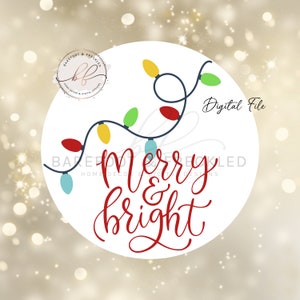 May include: A white circle with a red, blue, and yellow string of lights with the text "Merry & Bright" in red cursive lettering. The background is a blurry gold color.