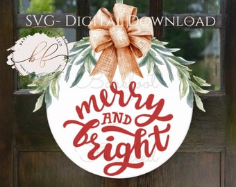 May include: A white round door hanger with a red "merry and bright" inscription. A brown bow with green leaves surrounds the inscription.