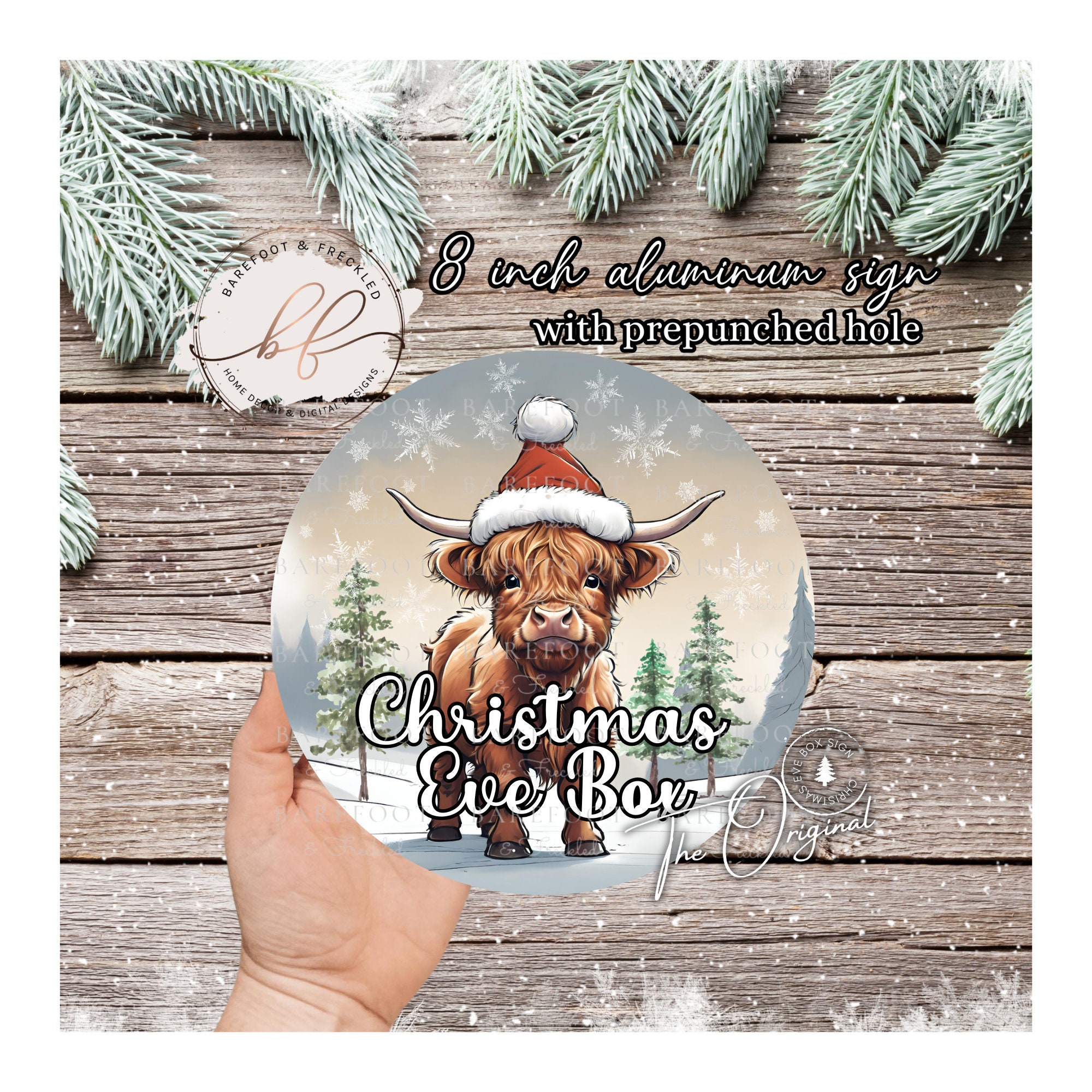 The Original Christmas Eve Gift Box Sign, 8 Inch Circle Aluminum Sign With Baby Highland Cow in a Santa Hat
