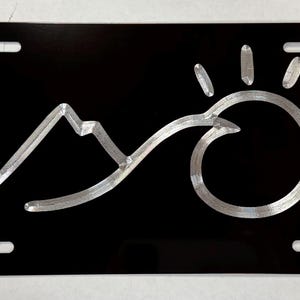 Mountains Ocean Wave Sun License Plate Car Tag Diamond Etched on Black Aluminum Metal Weatherproof & Rustproof Engraved Beach Gift