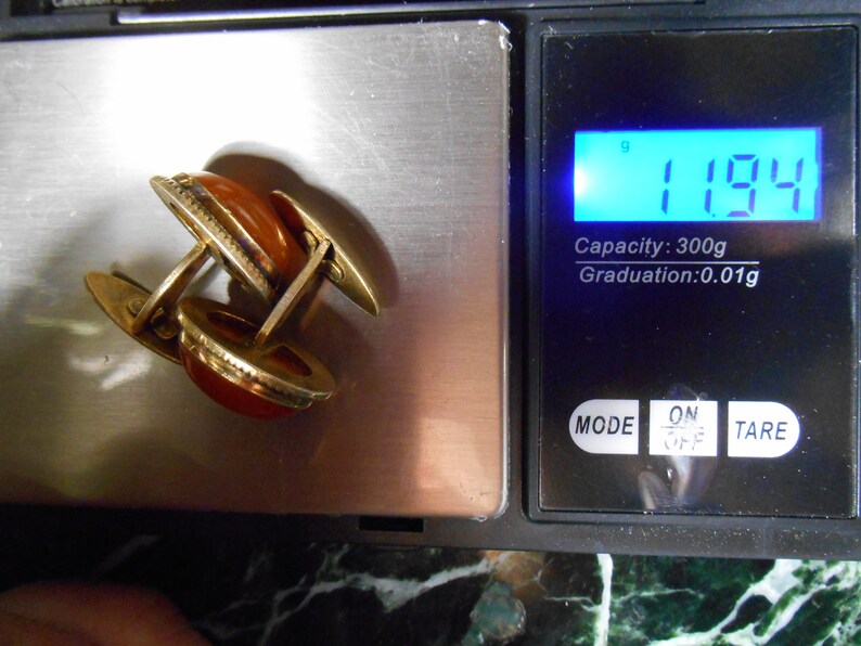 Silver cufflinks with amber the USSR.