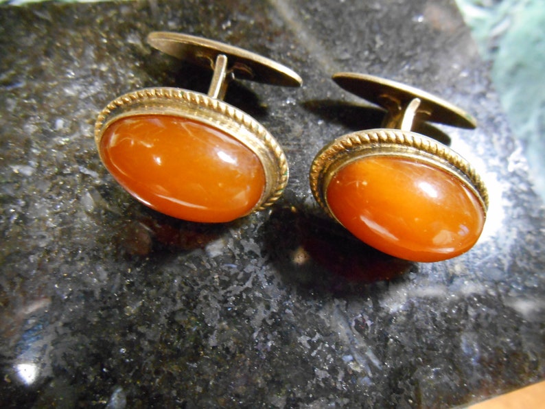 Silver cufflinks with amber the USSR.