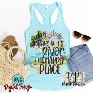 May include: A light blue tank top with the text "Days drinking at the river is my happy place" is displayed with a straw tote bag, sandals, sunglasses, and denim shorts. A digital design graphic is in the lower left corner.