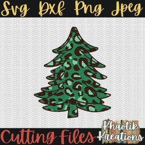 May include: A green and brown Christmas tree with a leopard print design. The tree is isolated on a white background.