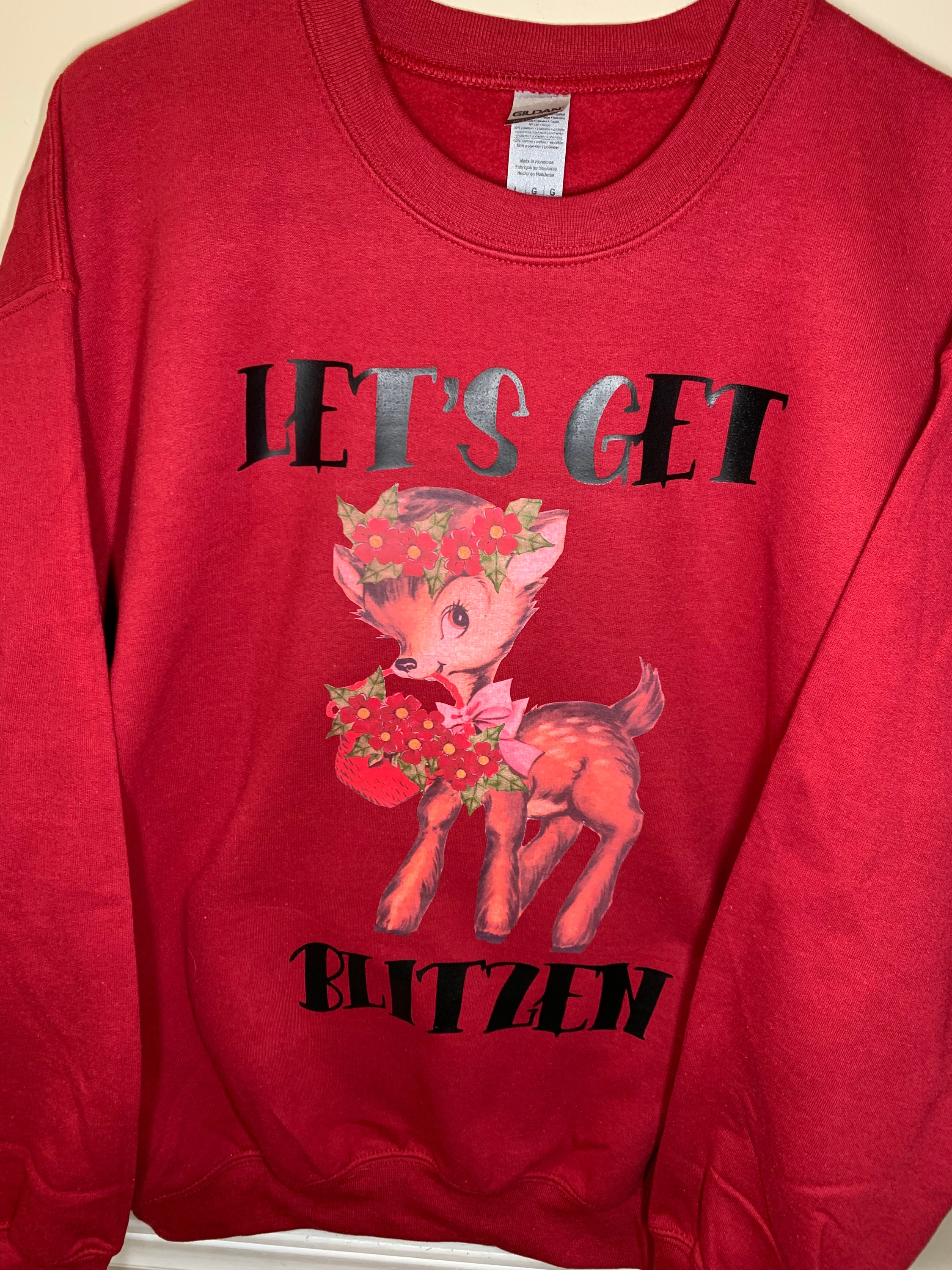 Let's get top blitzen sweater
