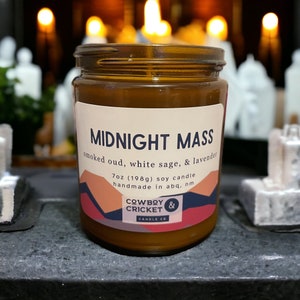 Midnight Mass Soy Candles and Melts Smoked Oud, White Sage, & Lavender Netflix Inspired 7 oz Amber Jar Candle