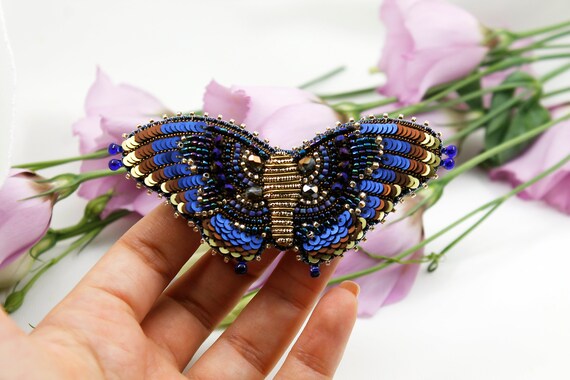 Boucles d'oreilles artisanales  Perles améthyste et papillon en métal