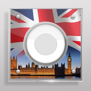 May include: A glass plaque with a circular cutout in the center. The plaque features a red, white, and blue Union Jack flag with a nighttime view of the Houses of Parliament and Big Ben in London, England.