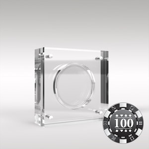 May include: A clear acrylic coin display case with a black and white poker chip featuring the number "100" in the centre.