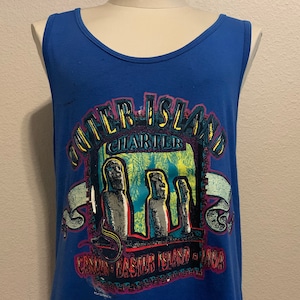 May include: Blue sleeveless tank top with a graphic print of three figures in front of palm trees. The text "Outer Island Charter" is above the figures and the text "Condom Easter Island - Java" is below the figures.