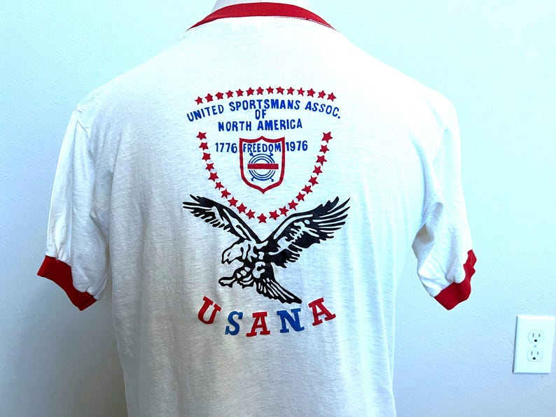 Vintage 70er Jahre Rückendruck United Sportsmans Assoc. von Nordamerika 1776 1976 USANA T Shirt Gr. L Bild 1