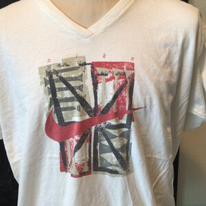 Vintage 90s Nike V-neck Roman numeral design T shirt XL