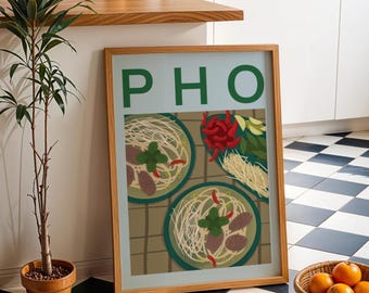 May include: A framed poster with the word "PHO" in green letters on a light blue background. The poster features a stylized illustration of three bowls of Vietnamese pho with noodles, meat, and herbs.