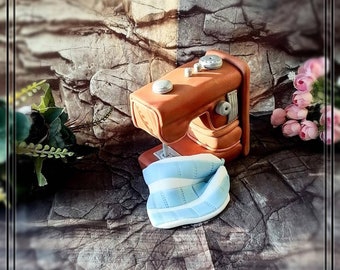 Sewing machine made of fondant as cake decoration for motif cakes, cake decoration