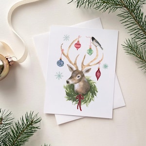 Carte pour les Fêtes Chevreuil avec décorations