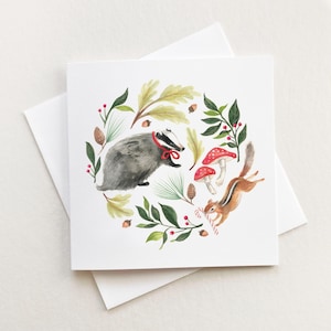 Blaireau et tamia pour les fêtes, carte d'art fantaisiste pour les fêtes, carte illustrée d'animaux, carte de Noël vierge