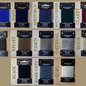 May include: A collection of 15 spools of wool/nylon thread for mending, each spool is labeled with a color name and the text "LINCATEX WOOL/NYLON FOR MENDING". The colors include: Royal, Navy, Airforce, Bottle Green, Claret, Chocolate, Khaki, Fawn, Oatmeal, Beige, Black, Dark Grey, Ecru.