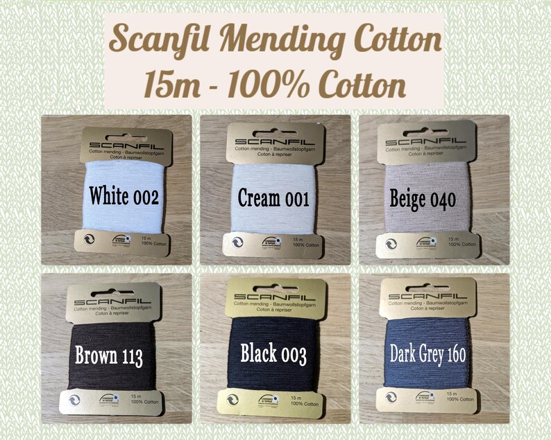 May include: Six spools of Scanfil Mending Cotton, each 15 meters long and 100% cotton. The colors are white, cream, beige, brown, black, and dark grey. Each spool has a label with the brand name, color, and color code.