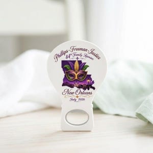 High-quality promotional swag giveaway bottle opener with a magnet backing, designed as a custom logo corporate business gift for trade shows.