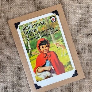 Biglietto di auguri di compleanno fatto a mano - Copertina di un libro a forma di coccinella. Cappuccetto Rosso