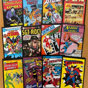 May include: A collection of twelve vintage DC comic book covers featuring iconic characters like Batman, Superman, The Flash, Wonder Woman, and Sgt. Rock. Each cover displays colourful illustrations, bold typography, and classic issue numbering.