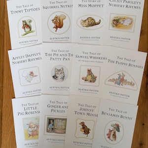 Zestaw 12 pocztówek z okładkami książek Beatrix Potter.
